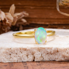Minimalist Oval Cut 1.5 Carat Opal Solitaire Engagement Ring
