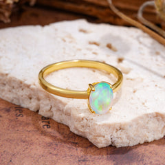 Minimalist Oval Cut 1.5 Carat Opal Solitaire Engagement Ring