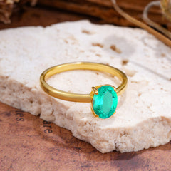 Minimalist Oval Cut 1.5 Carat Emerald Solitaire Engagement Ring
