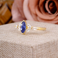 Classic Marquise Cut Tanzanite Engagement Ring Sider with 3-stone