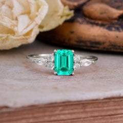 1 Carat 4 Prong Emerald Cut Emerald Classic Side Stone Engagement Ring