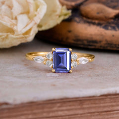 1 Carat 4 Prong Emerald Cut Tanzanite Classic Side Stone Engagement Ring