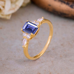 1 Carat 4 Prong Emerald Cut Tanzanite Classic Side Stone Engagement Ring