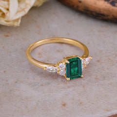 1 Carat 4 Prong Emerald Cut Emerald Classic Side Stone Engagement Ring