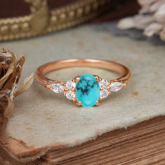 Oval Cut 4 Prong Turquoise Classic Side Stone Engagement Ring