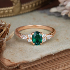 Oval Cut Emerald Classic Side Stone Engagement Ring