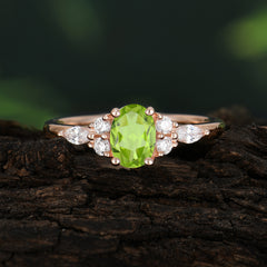 Oval Cut Peridot Classic Side Stone Engagement Ring