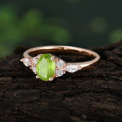 Oval Cut Peridot Classic Side Stone Engagement Ring