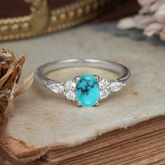 Oval Cut 4 Prong Turquoise Classic Side Stone Engagement Ring