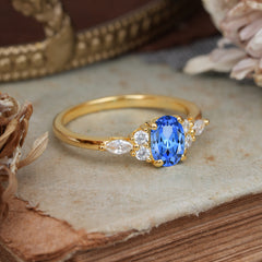 Oval Cut Sapphire Classic Side Stone Engagement Ring