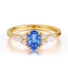 Oval Cut Sapphire Classic Side Stone Engagement Ring