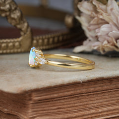 Oval Cut Opal Classic Side Stone Engagement Ring