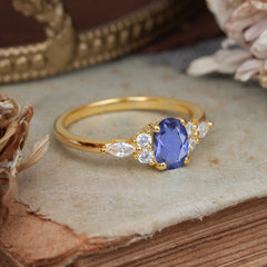Oval Cut 4 Prong Tanzanite Classic Side Stone Engagement Ring