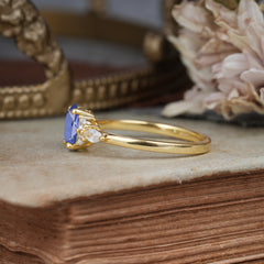 Oval Cut 4 Prong Tanzanite Classic Side Stone Engagement Ring
