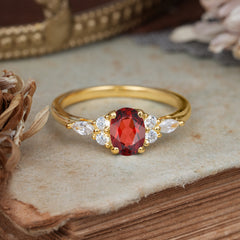 Oval Cut Garnet Classic Side Stone Engagement Ring