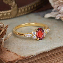 Oval Cut Garnet Classic Side Stone Engagement Ring