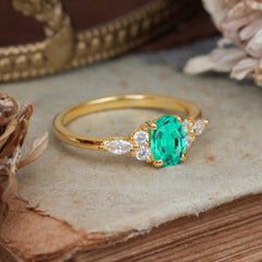 Oval Cut Emerald Classic Side Stone Engagement Ring