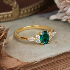 Oval Cut Emerald Classic Side Stone Engagement Ring