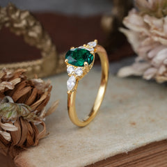 Oval Cut Emerald Classic Side Stone Engagement Ring