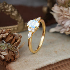 Oval Cut 4 Prong Moonstone Classic Side Stone Engagement Ring