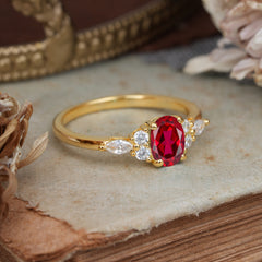 Oval Cut 4 Prong Ruby Classic Side Stone Engagement Ring