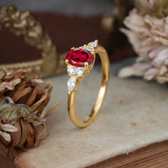 Oval Cut 4 Prong Ruby Classic Side Stone Engagement Ring