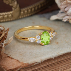 Oval Cut Peridot Classic Side Stone Engagement Ring