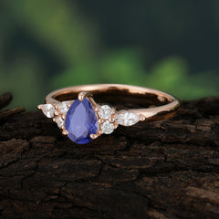 Classic Pear Shaped Side Stone Tanzanite Engagement Ring