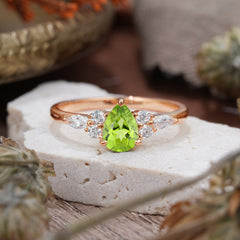 3 Prong Classic Pear Cut Side Stone Peridot Engagement Ring