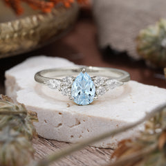 3 Prong Classic Pear Cut Side Stone Aquamarine Engagement Ring