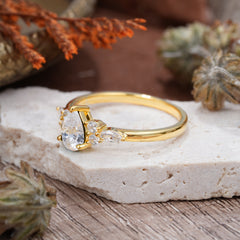 3 Prong Classic Pear Cut Side Stone Moissanite Engagement Ring