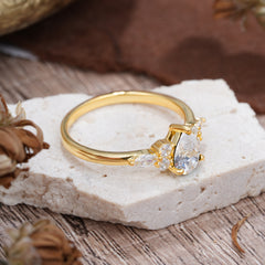 3 Prong Classic Pear Cut Side Stone Moissanite Engagement Ring