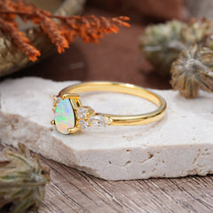 3 Prong Classic Pear Cut Side Stone Opal Engagement Ring