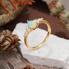 3 Prong Classic Pear Cut Side Stone Opal Engagement Ring