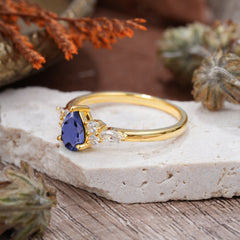 Classic Pear Shaped Side Stone Tanzanite Engagement Ring