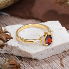 3 Prong Classic Pear Cut Side Stone Garnet Engagement Ring