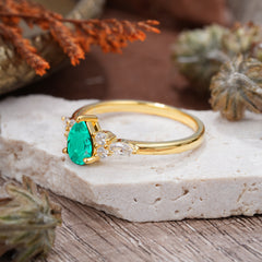 3 Prong Classic Pear Cut Side Stone Emerald Engagement Ring