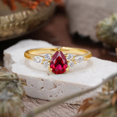 3 Prong Classic Pear Cut Side Stone Ruby Engagement Ring