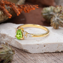 3 Prong Classic Pear Cut Side Stone Peridot Engagement Ring