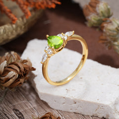 3 Prong Classic Pear Cut Side Stone Peridot Engagement Ring