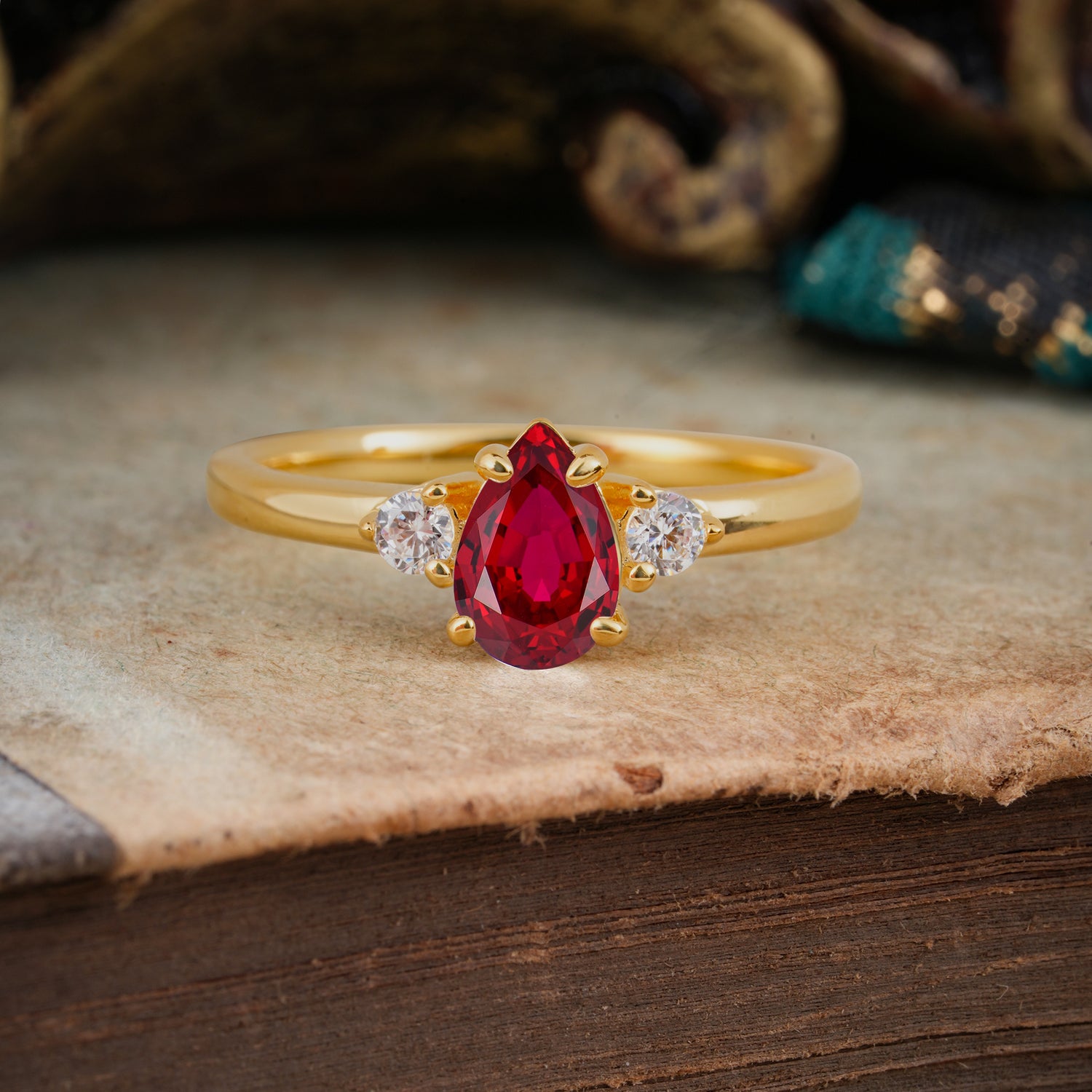 Classic Pear Cut Ruby Three Stone Engagement Ring Four Claw Prong Setting