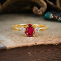 Classic Pear Cut Ruby Three Stone Promise Ring Four Claw Prong Setting