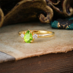 Classic Pear Cut Peridot Three Stone Promise Ring Four Claw Prong Setting