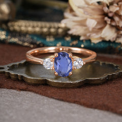 1 Carat Oval Shaped Classic Three Stone Tanzanite Wedding Ring