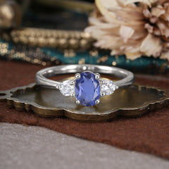 1 Carat Oval Shaped Classic Three Stone Tanzanite Wedding Ring