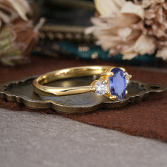 1 Carat Oval Shaped Classic Three Stone Tanzanite Wedding Ring
