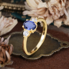 1 Carat Oval Shaped Classic Three Stone Tanzanite Wedding Ring