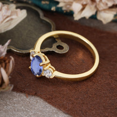 1 Carat Oval Shaped Classic Three Stone Tanzanite Wedding Ring