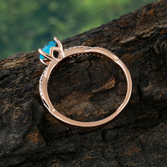 Classic Round Cut Turquoise Engagement Ring with Twisted Band