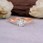 Classic Round Cut Lab Diamond Engagement Ring with Twisted Band featuring a sparkling round diamond and elegant twisted band design.